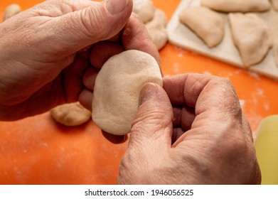 Close-up Of Hands Making Dumplings. 