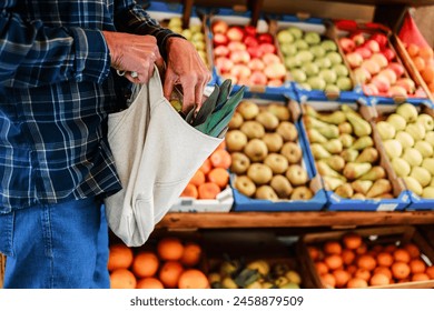  Closeup hands of man shopping at farm market. Senior customer buying at grocery store. Small business concept - Powered by Shutterstock