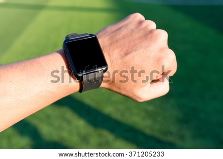 Close-up hands of man using his smart watch exercise