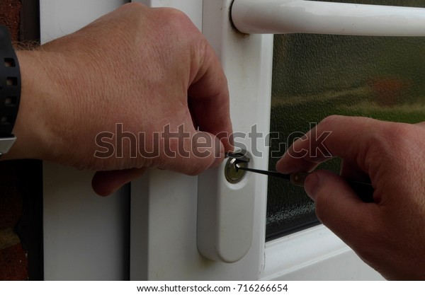 Closeup Hands Picking Door Lock Stock Photo Edit Now 716266654