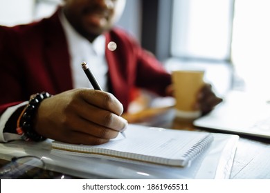 Closeup Of Hands Right Handed African Manager Write On Document