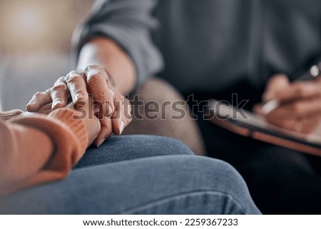 Closeup, hands and support in therapy, conversation and grief with compassion, empathy or support. Zoom, hand or female with sadness, therapist or communication for solutions, mental health or stress