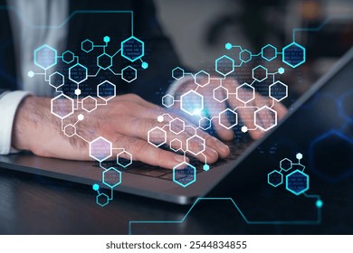 Close-up of hands typing on a laptop with futuristic hexagonal digital graphics overlay and binary code. Concept of technology and data