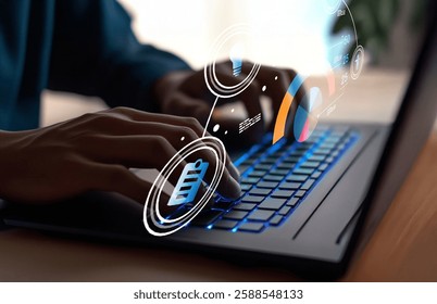 Close-up of hands typing on a laptop keyboard with a digital overlay of icons, showcasing technology and data visualization in a contemporary workspace setting.