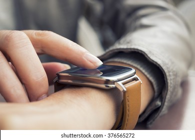 Closeup Of Hands Woman Using A Smartwatch