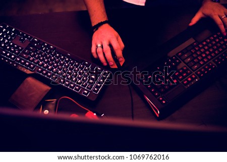 Closeup of hands working on computer keyboard