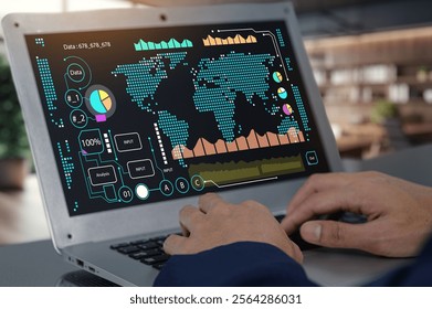 Close-up of hands working on a laptop displaying a vibrant data analysis interface with a world map, colorful charts, and various metrics for performance insights.