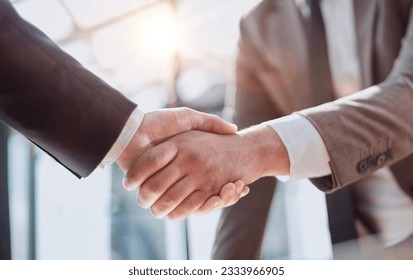 closeup of handshake of business partners - Shutterstock ID 2333966905