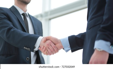 closeup. handshake business partners after bargain