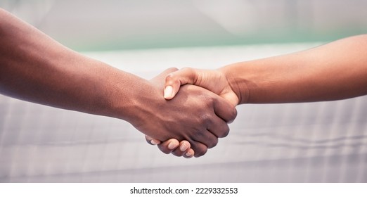 Closeup, handshake and sport for support, teamwork or respect outdoor at tennis court with diversity. Shaking hands, training and sports for fitness, exercise or training together with tennis player - Powered by Shutterstock