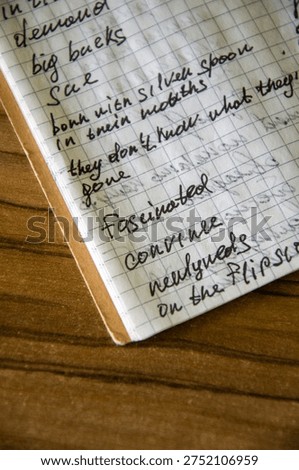 Closeup of Handwritten Notes on Graph Paper