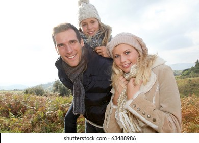 Closeup Of Happy Family In Fall Season