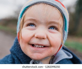 Close-up Of Happy Toddler Girl With Blue Eyes - Kempen, Germany