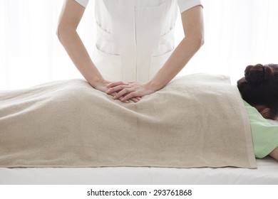 Closeup of happy woman receiving back massage at salon spa - Shutterstock ID 293761868