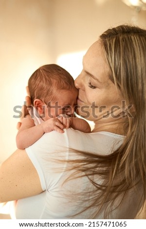 Similar – Image, Stock Photo Mother hugging her sleeping baby girl
