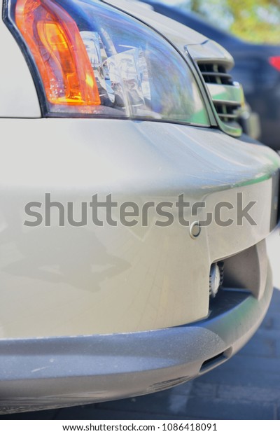 Close-up headlights of\
car, art soft focus