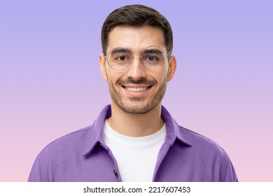 Close-up Headshot Portrait Of Young Male Teacher Face In Round Glasses Looking At Camera, Isolated On Purple Background