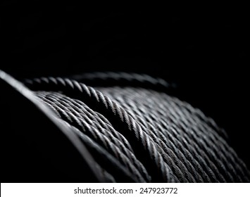 Closeup Of Heavy Duty Thick Gauge American Steel Woven Cable Made In America With Black Background