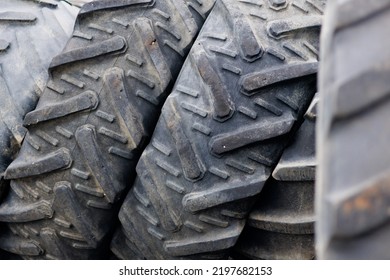 Close-up Of Heavy Duty Tires Partially Damaged By Nails