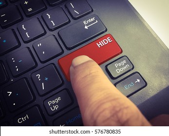 Close-up the HIDE button on the keyboard and have Red button isolate black keyboard
