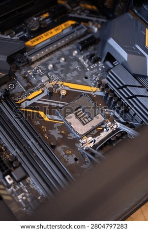 A close-up of a high-tech computer motherboard showcasing intricate circuitry and components.