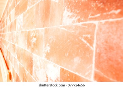 Closeup of himalayan salt wall in sauna room as  textured concept