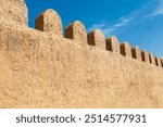 Close-up of a historical Kazakh citadel wall made of clay