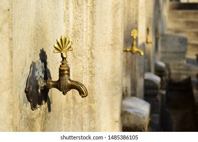 Closeup Historical Water Tap Used For Islamic Ritual Washing Or Ablution At Süleymaniye Mosque (opened In 1558) In Istanbul, Turkey.