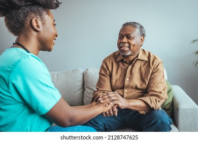 Close-up of home caregiver and senior woman holding hands. Professional Elderly Care. Professional care for elderly at nursing homes. Nurse holding hand of senior man in rest home - Powered by Shutterstock