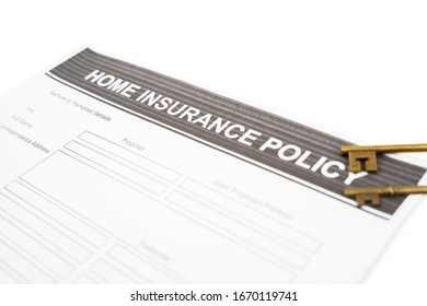 Closeup Of Home Insurance Policy Document Paper Near Some Old Keys, Isolated In White Background