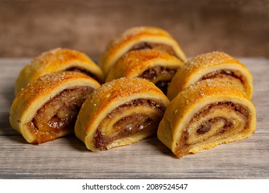 Close-up Of Homemade Filled Pastries - Cut Rugelach Cookies. Made With Butter And Cream Cheese Doughs Filled With Apricot, Raisins And Walnuts.