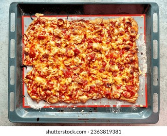 Close-up of homemade pizza texture. View from above. pizza background - Shutterstock ID 2363819381