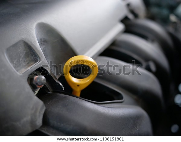 closeup hood car engine\
oil.