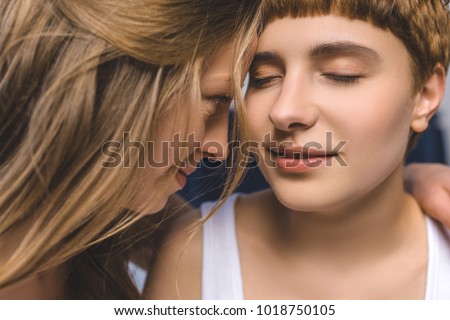 Close Up Hot Of Attractive Cuddling Lesbian Couple Close Up Hot Of Attractive Cuddling Lesbian Couple
