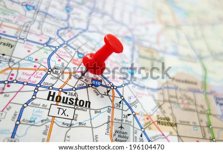 Closeup of a Houston, Texas map with red pin                               