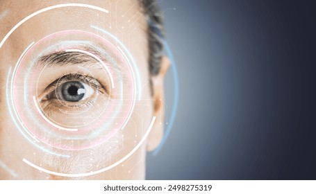 Close-up of a human eye with futuristic digital interface graphics overlay on a gradient background. Concept of vision and facial recognition technology - Powered by Shutterstock