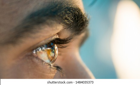 Closeup of a human eye A person looking at front with a eye closeup shot