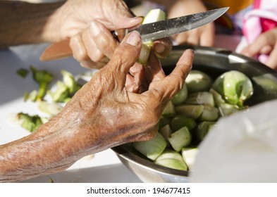 Closeup Of Human Hands Cooking Vegetables.