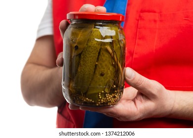 Closeup Of Hypermarket Or Supermarket Male Employee Holding Pickle Jar Isolated On White Studio Background