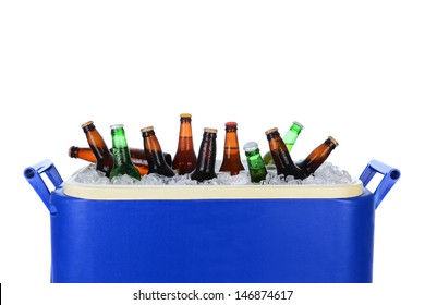 Closeup Of An Ice Chest Full Of Ice And Assorted Beer Bottles. Horizontal Format On White.