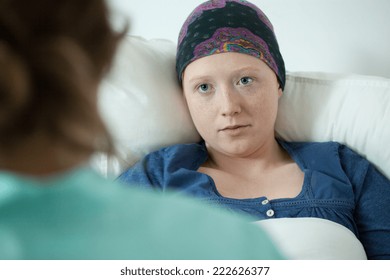 Close-up Of Ill With Leukemia Girl Wearing Headscarf