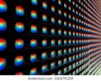 Close-up of an illuminated LED matrix display, showing a grid of red and blue diodes glowing against a dark background, emphasizing digital technology and modern electronics