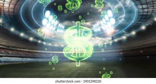 Close-up Image Of The American Dollar Sign Against The Background Of The Stadium. The Concept Of Sports Betting, Making A Profit From Betting, Gambling. American Football