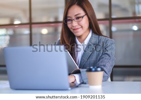 Similar – Foto Bild Frau mit Laptop bei der Arbeit zu Hause