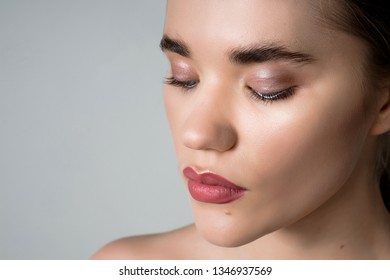Closeup image of beautiful woman eye with fashion makeup and long eyelashes. Browslifting and lashlifting