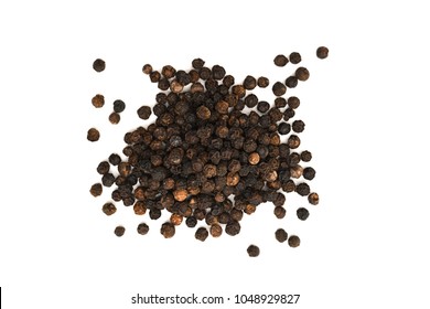 Close-up image of black pepper on white background, view above