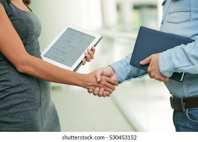 Close-up Image Of Business People Greeting Each Other