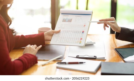 Close-up Image Of Business Team Analyse Business Financial Data Chart And Graph Report Together In The Meeting Room. Business Person In A Workplace