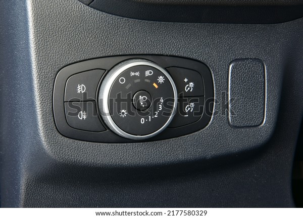 Closeup image of car\
lighting control switch
