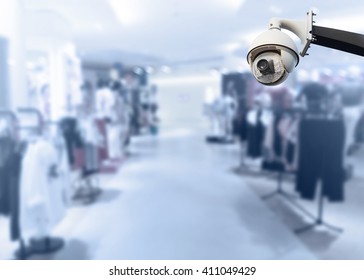 closeup image of CCTV security camera at shopping center